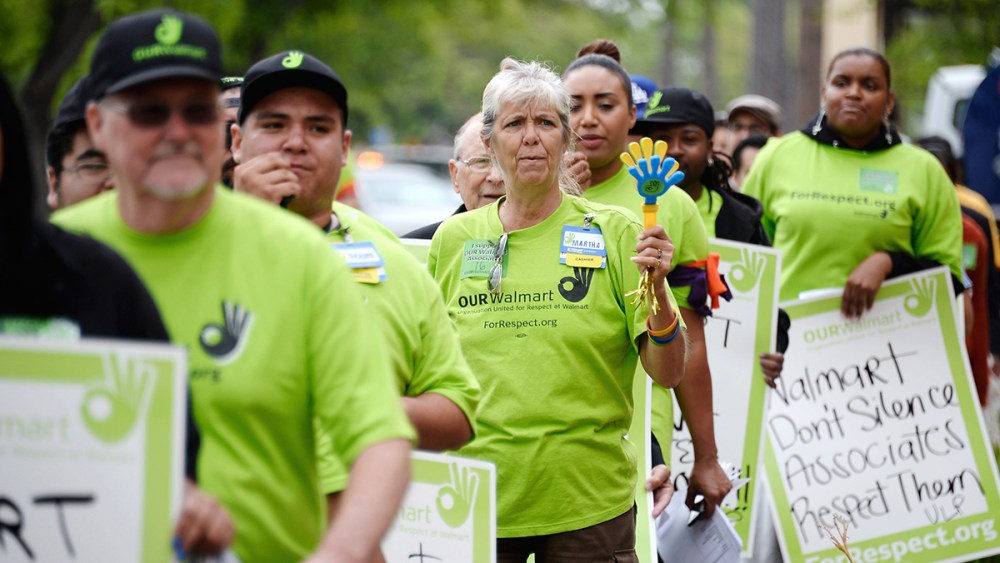 Walmart Workers Begin Bus Rally Heading To Protest At Company's Annual Meeting