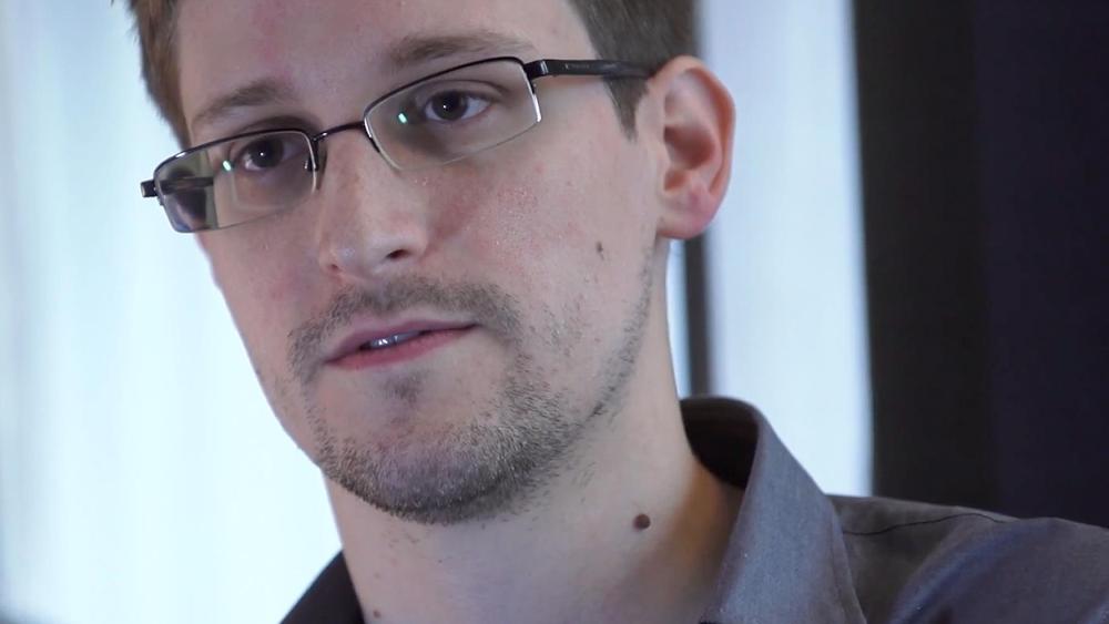 In this handout photo provided by The Guardian, Edward Snowden speaks during an interview in Hong Kong. (Photo by The Guardian via Getty Images)