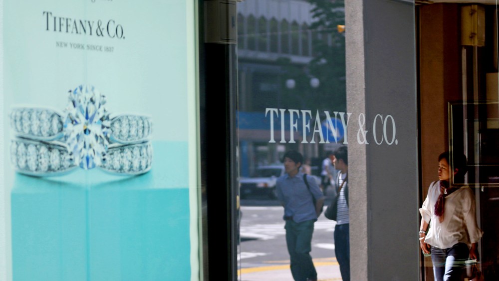 A pedestrian walks past a Tiffany & Co. advertisement in Sapporo, Hokkaido Prefecture, Japan, on June 9, 2013.