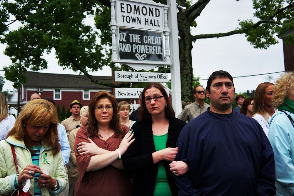 People attend a remembrance event on the six month anniversary of the massacre at Sandy Hook Elementary School on June 14, 2013 in Newtown, Connecticut.