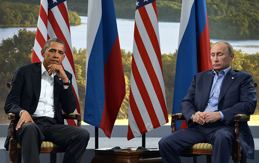 Barack Obama and Russian President Vladimir Putin during the G8 summit on June 17, 2013.   AFP PHOTO / JEWEL SAMAD        (Photo by Jewel Samad/AFP/Getty Images)