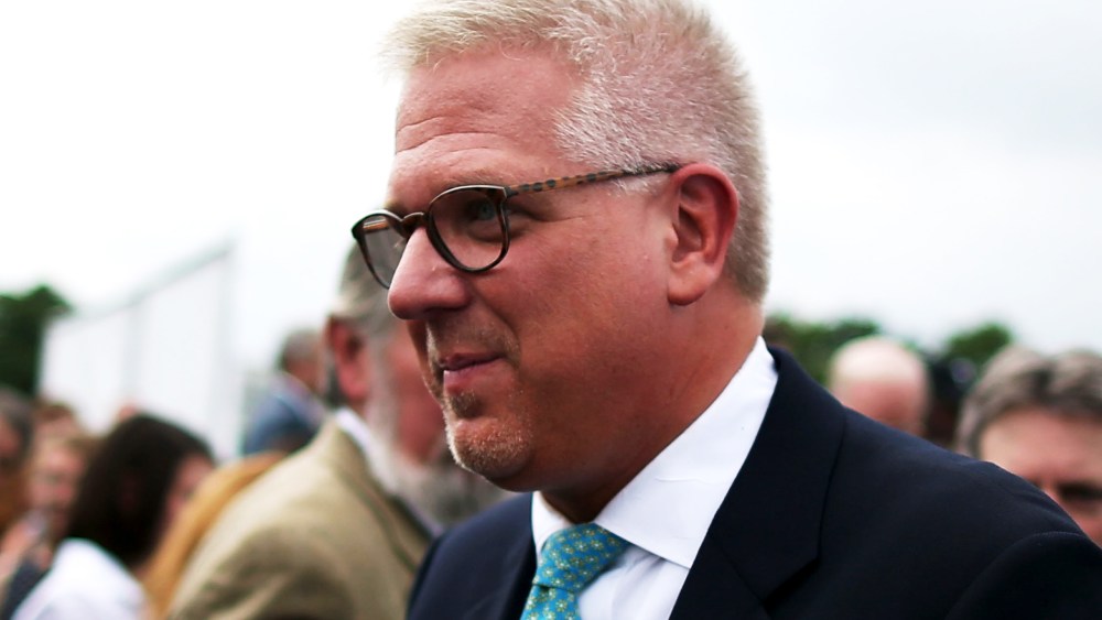 Glenn Beck walks through the crown after speaking to supporters at a Tea Party rally in front of the U.S. Capitol, June 17, 2013 in Washington, DC.