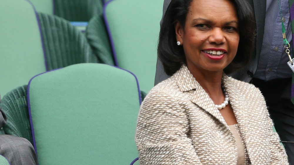 Condoleezza Rice watches the gentlemen's singles match on day one of the Wimbledon Lawn Tennis Championships on June 24, 2013 in London, England.