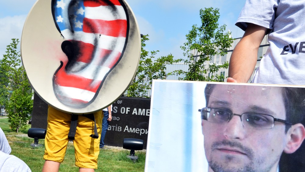 Ukrainian Internet Party activists hold a "tap the phone and internet lines" protest, June 27, 2013.