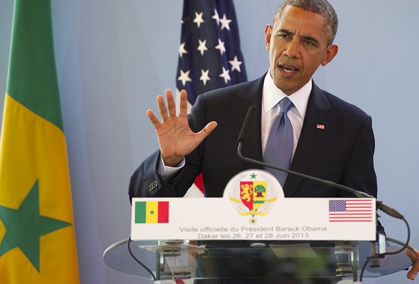 US President Barack Obama speaks during a press conference with Senegal's President following meetings at the Presidential Palace in Dakar, June 27, 2013. (Photo by Saul Loeb/AFP/Getty Images)