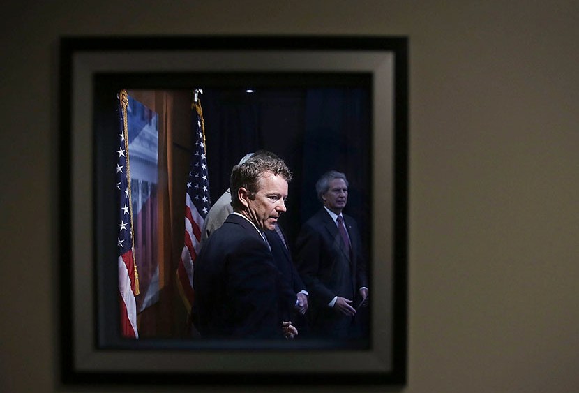 U.S. Sen. Rand Paul listens during a news conference on Syria June 27, 2013 on Capitol Hill in Washington, DC. (Photo by Alex Wong/Getty)