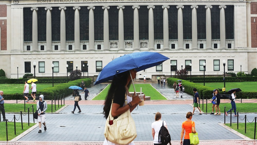 People walk through the Columbia University campus on July 1, 2013.