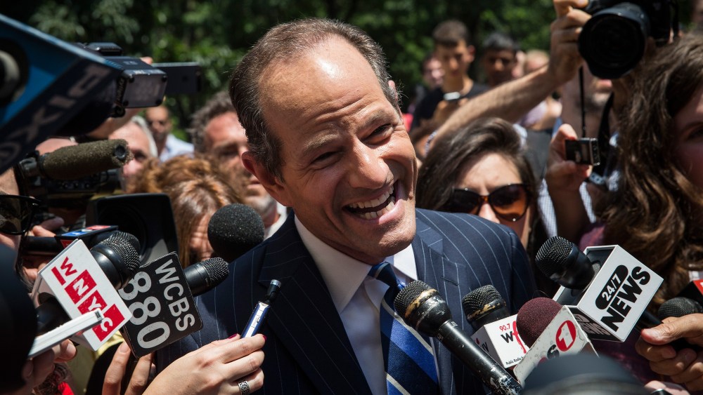 NEW YORK, NY - JULY 08:  Former New York Gov. Eliot Spitzer is mobbed by reporters while attempting to collect signatures to run for comptroller of New York City on July 8, 2013 in New York City. (Photo by Andrew Burton/Getty Images) *** BESTPIX ***