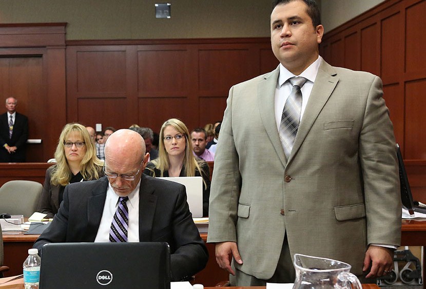George Zimmerman with defense counsel Don West, listens to judge Debra Nelson as she questions him on his understanding of the proceedings, in Seminole circuit court, July 9, 2013 in Sanford, Florida. (Photo by Joe Burbank/Pool/Getty Images)