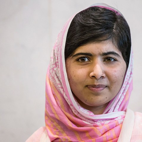 Malala Yousafzai, the 16-year-old Pakistani advocate for girls education who was shot in the head by the Taliban, pauses for a media photo opportunity while attending the United Nations Youth Assembly on July 12, 2013 in New York City. (Photo by Andrew...