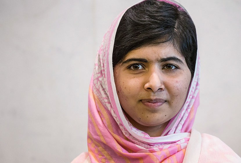 Malala Yousafzai, the 16-year-old Pakistani advocate for girls education who was shot in the head by the Taliban, pauses for a media photo opportunity while attending the United Nations Youth Assembly on July 12, 2013 in New York City. (Photo by Andrew...