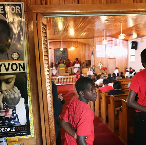 Parishioners attend Sunday service at Allen Chapel AME church in the historic black neighborhood of Goldsboro on July 14, 2013 in Sanford, Florida. During the service Pastor Valarie Houston compared seventeen-year-old Trayvon Martin, who was shot and...