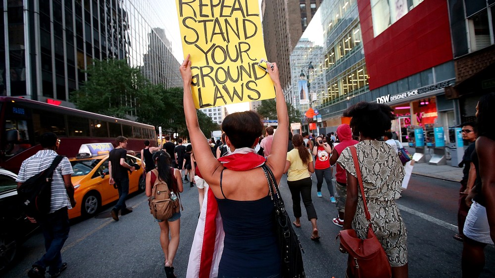 People march through the street after a rally for Trayvon Martin, July 14, 2013, in New York, N.Y.