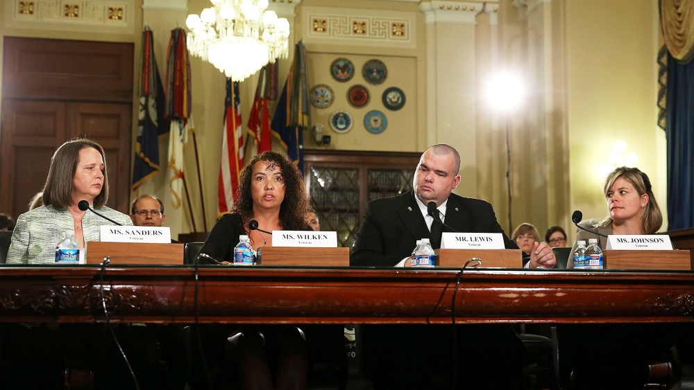 Military sexual assault survivors sit at the witness table while participating in a House Veteran Affairs Subcomittee on Capitol Hill, July 19, 2013 in Washington, DC.