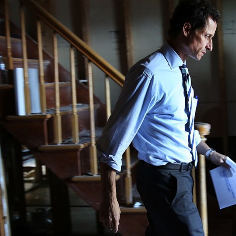 Anthony Weiner, a leading candidate for New York City mayor, walks out of a storm damaged home after meeting with residents in Staten Island whose homes were damaged by Hurricane Sandy on July 26, 2013 in New York City. (Photo by Spencer Platt/Getty...