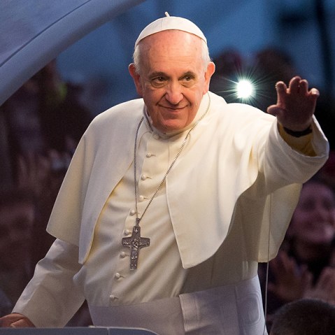Pope Francis waves from the Popemobile on his way to attend the Via Crucis on Copacabana Beach during World Youth Day celebrations on July 26, 2013 in Rio de Janeiro, Brazil. (Photo by Buda Mendes/Getty Images)