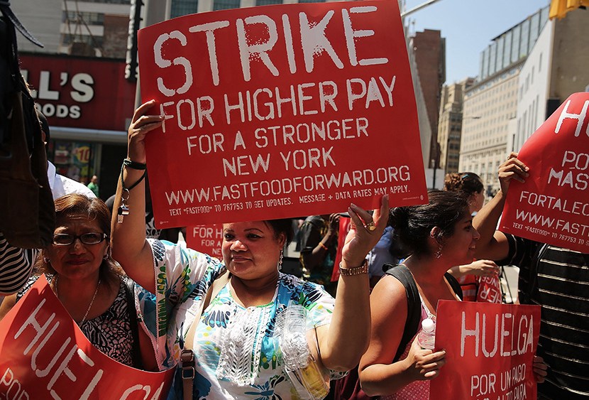 Employees and supporters demonstrate outside of a Wendy's fast-food restaurant to demand higher pay and the right to form a union on July 29, 2013 in New York City. (Photo by Spencer Platt/Getty Images)