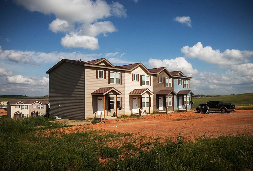 New townhouses are seen next to a highway on July 29, 2013 in Watford City, North Dakota. (Photo by Andrew Burton/Getty)