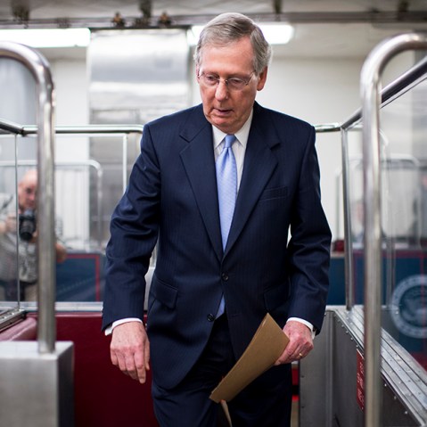 Senate Minority Leader Mitch McConnell gets on the Senate subway in the Capitol following a vote on Tuesday, July 30, 2013. (Photo by Bill Clark/CQ Roll Call/Getty)