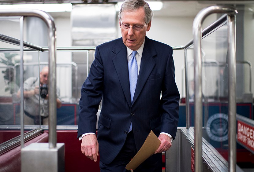 Senate Minority Leader Mitch McConnell gets on the Senate subway in the Capitol following a vote on Tuesday, July 30, 2013. (Photo by Bill Clark/CQ Roll Call/Getty)