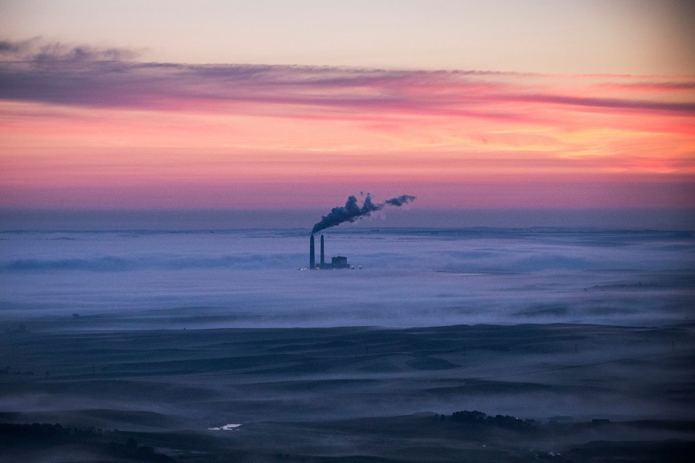 A coal-burning energy plant is seen in the early morning hours of July 30, 2013 near Bismarck, North Dakota. (Photo by Andrew Burton/Getty)