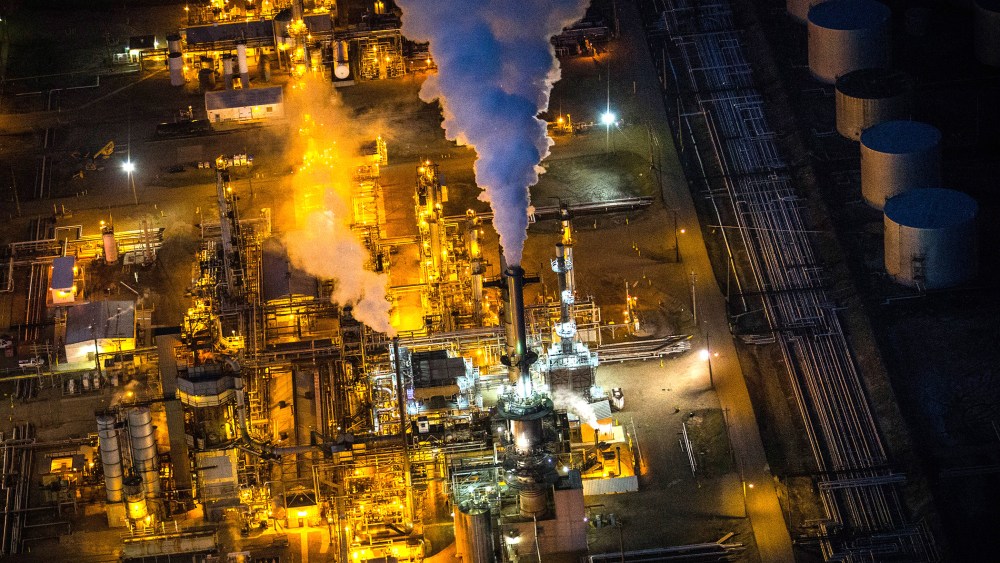 A gas and oil refinery is seen in an aerial view in the early morning hours of July 30, 2013 in Bismarck, North Dakota.