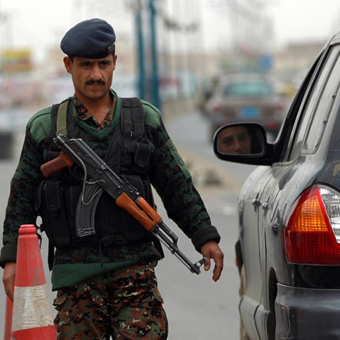 A Yemeni soldier checks vehicles near Sanaa International Airport on August 6, 2013 in Yemen. The United States ordered Americans to leave Yemen "immediately" amid a worldwide alert linked to electronic intercepts from Al-Qaeda leader Ayman al-Zawahiri...