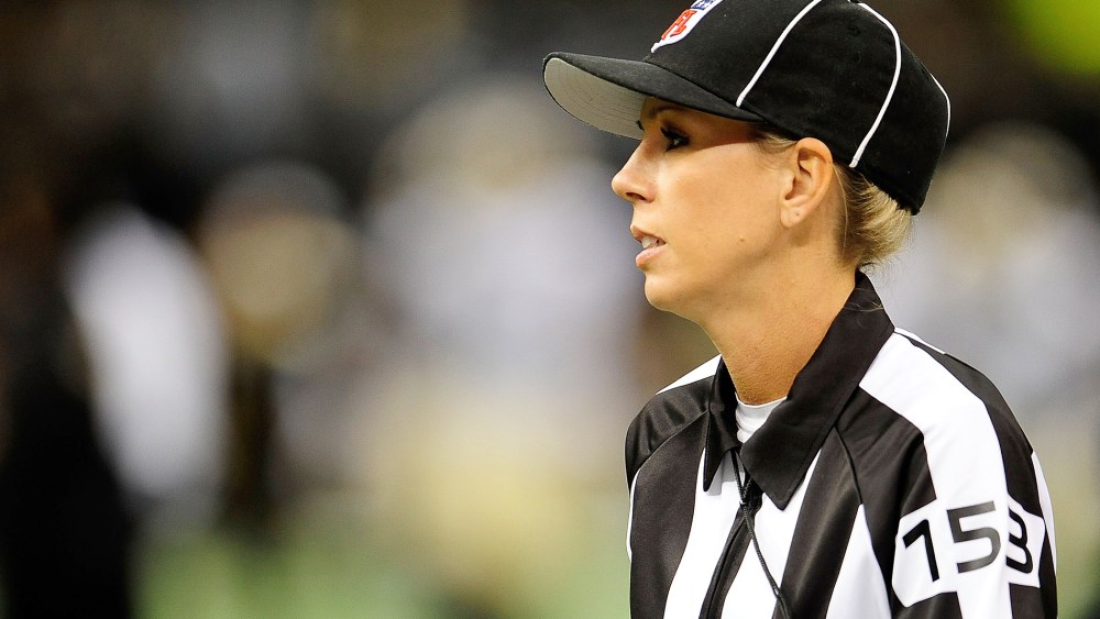 Line judge Sarah Thomas takes the field for a preseason game between the Oakland Raiders and the New Orleans Saints at the Mercedes-Benz Superdome on Aug. 16, 2013 in New Orleans, La. (Photo by Stacy Revere/Getty)