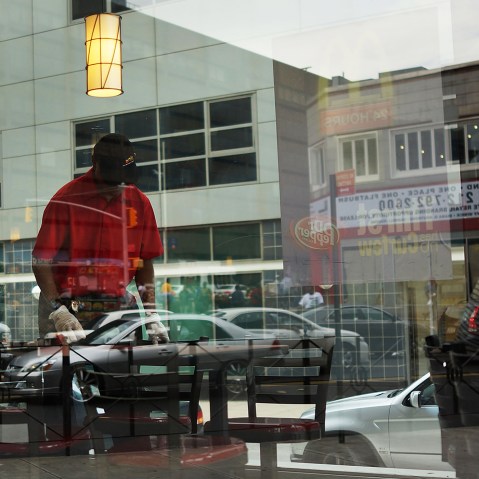 A man works inside a McDonald's fast food restaurant on Aug. 23, 2013 in the Brooklyn borough of New York, N.Y.