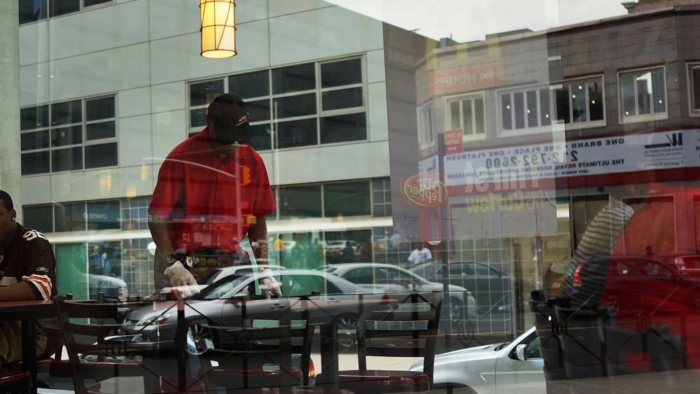 A man works inside a McDonald's fast food restaurant on Aug. 23, 2013 in the Brooklyn borough of New York, N.Y.