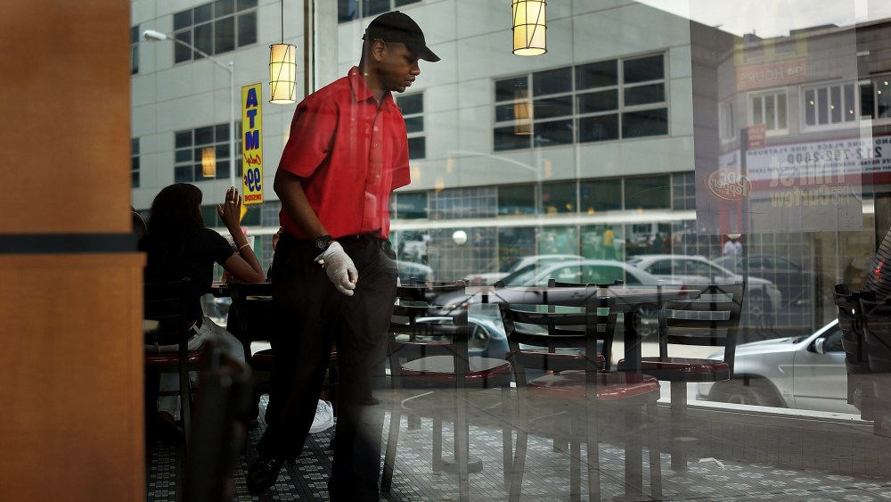 A man works inside a McDonald's restaurant on Aug. 23, 2013 in the Brooklyn borough of New York City.
