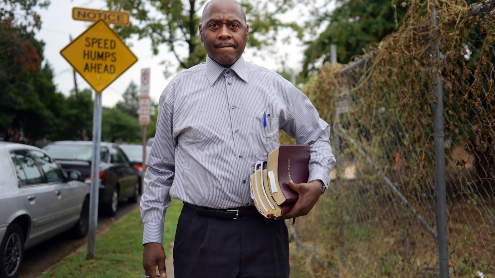 Cleveland Wright, 55, makes his way to the church he attends at Resurrection Church of God in Christ on Sunday, August 18, 2013, in Washington, DC.