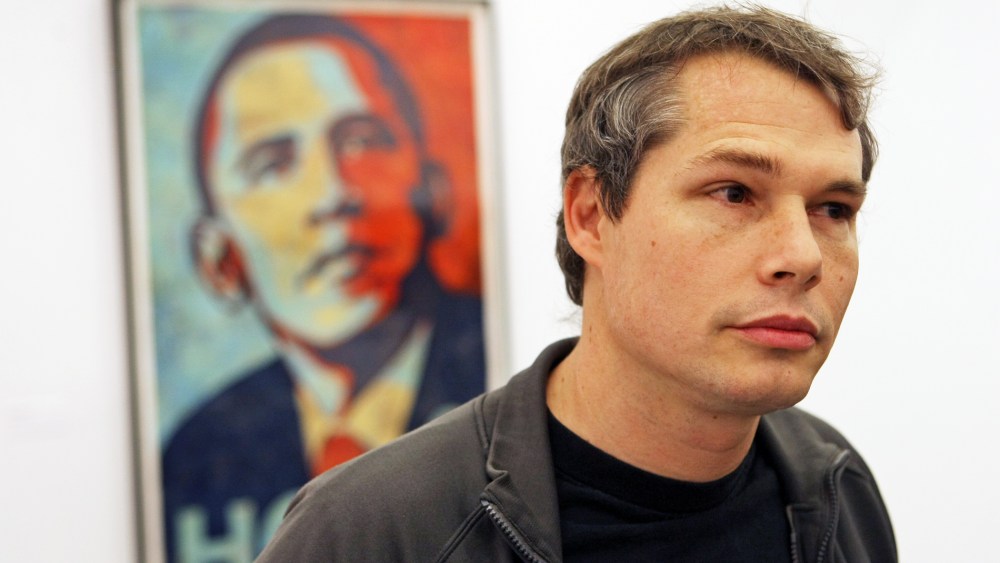 At the Institute of Contemporary Art, an exhibit of Shepard Fairey's first solo museum show with the Obama "Hope," 2008, over the artist's shoulder. (Photo by David L. Ryan/Boston Globe/Getty)