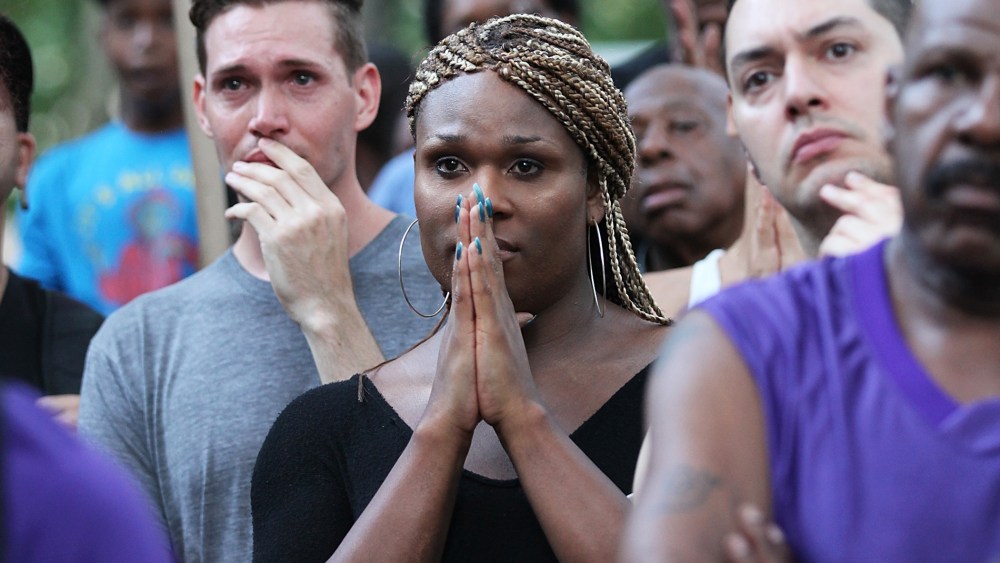 People gather at a vigil for transgender woman Islan Nettles at Jackie Robinson Park in Harlem on August 27, 2013 in New York City.