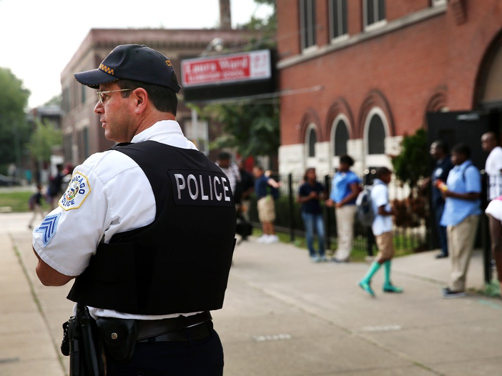 Chicago Police And Neighborhood Officials Escort Children To School