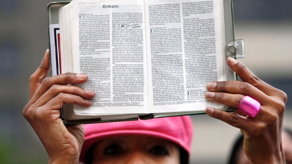Brenda Buckner, of Lakeridge, Va., holds up a bible in Washington, on May 5, 2009.
