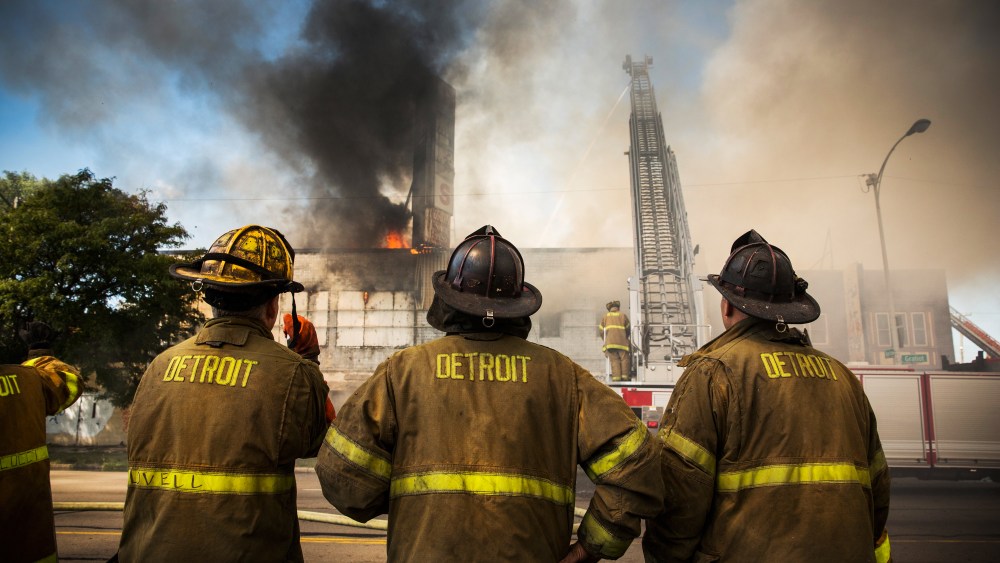 Members of the Detroit Fire Department fight a two-alarm fire that broke out in an abandoned building on September 4, 2013.