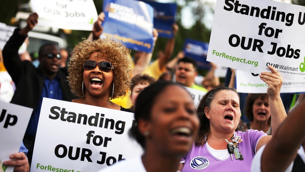 Hundreds of demonstrators rally outside a Walmart store in Hyattsville, Maryland, Sept. 5, 2013.