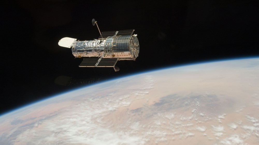 In this Tuesday, May 19, 2009 photo released by NASA, the Hubble Space Telescope is seen from the Space Shuttle Atlantis.