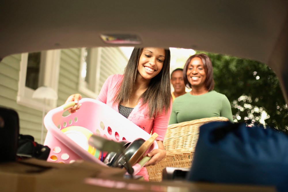 Image: Girl Packing for College