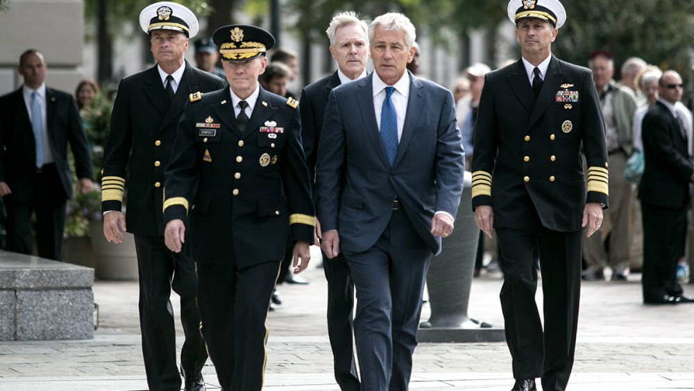 Defense Secretary Chuck Hagel Lays Wreath For Navy Yard Shooting Victims