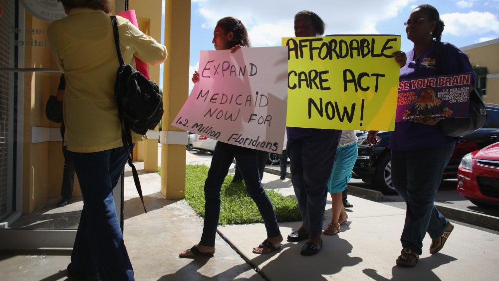 Activists Demonstrate In Support Of Medicaid Expansion And The Affordable Care Act in Miami, Florida, September 20, 2013.