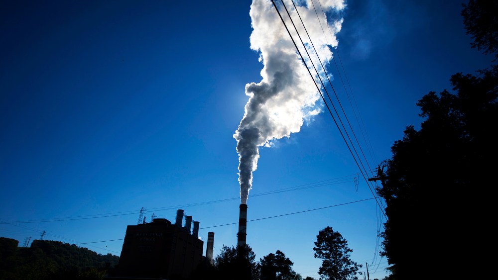 A plume of exhaust extends from the Mitchell Power Station, a coal-fired power plant in New Eagle, Pennsylvania, Sept. 24, 2013.