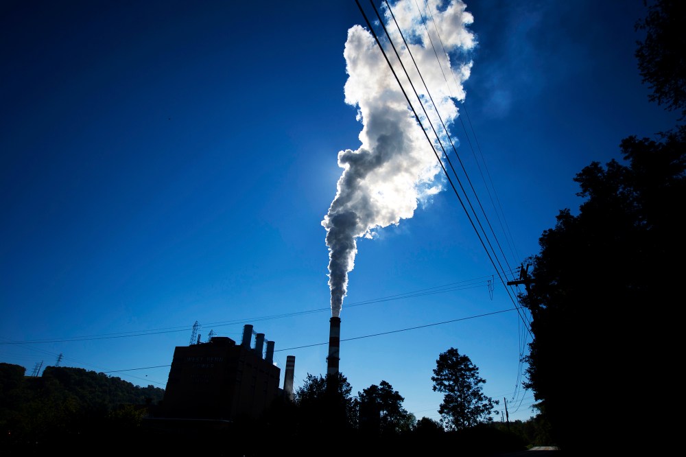 A plume of exhaust extends from the Mitchell Power Station, a coal-fired power plant in New Eagle, Pennsylvania, Sept. 24, 2013.