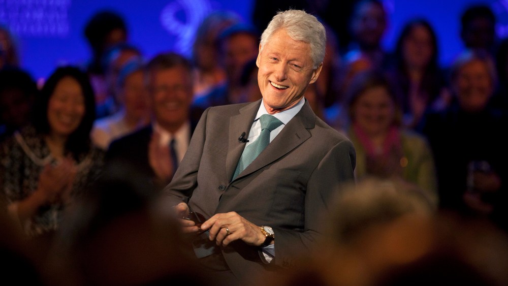 Former U.S. President Bill Clinton smiles during a taping in New York City, Sept. 25, 2013.