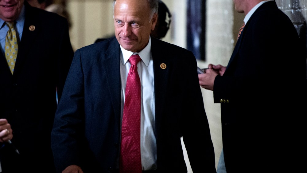 Rep. Steve King (R-IA) speaks with reporters as he leaves the House Republican Conference meeting in the basement of the Capitol on Sept. 26, 2013.