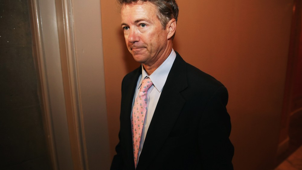Sen. Rand Paul leaves a Republican Senate caucus meeting, September 30, 2013 in Washington, DC.