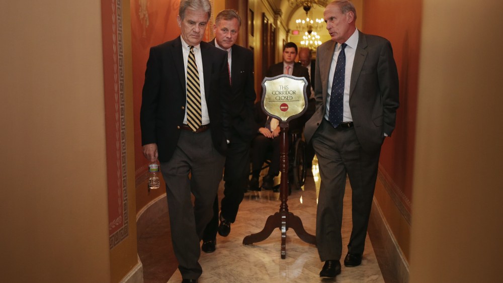 (L-R) Sen. Tom Coburn (R-OK), Sen. Richard Burr (R-NC) and Sen. Dan Coats (R-IN) leave a Republican Senate caucus meeting at the U.S. Capitol September 30, 2013 in Washington, DC.