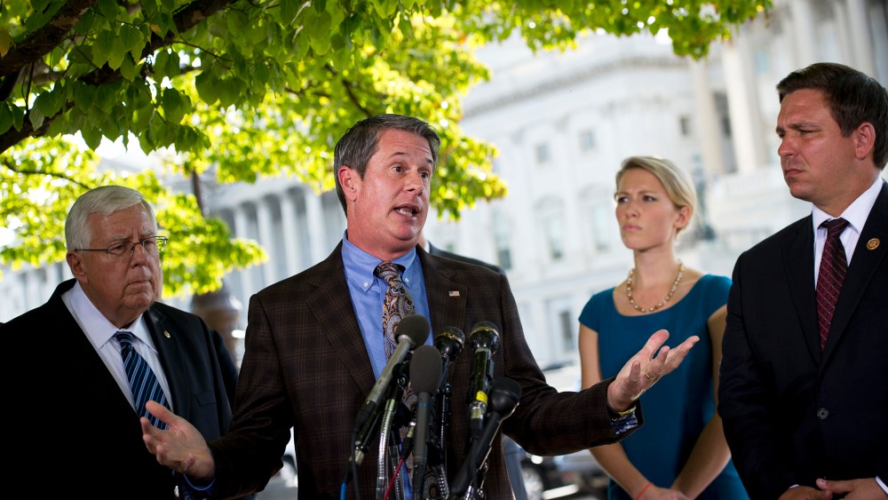 US Senator David Vitter (C) speaks during a press conference on Capitol Hill, September 30, 2013.