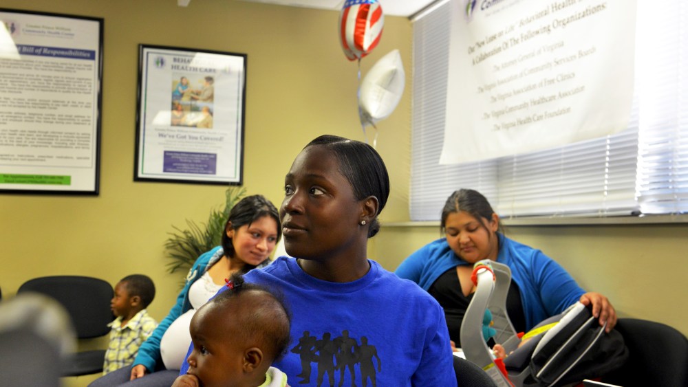 Paula Thornhill waits at the Greater Prince William Community Health Center on Tuesday, October 1, 2013, in Woodbridge, VA.